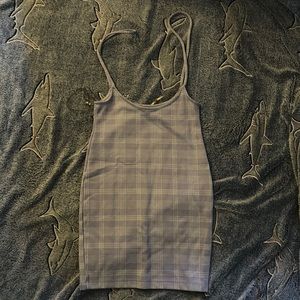 A skirt/ dress that is purple in the light